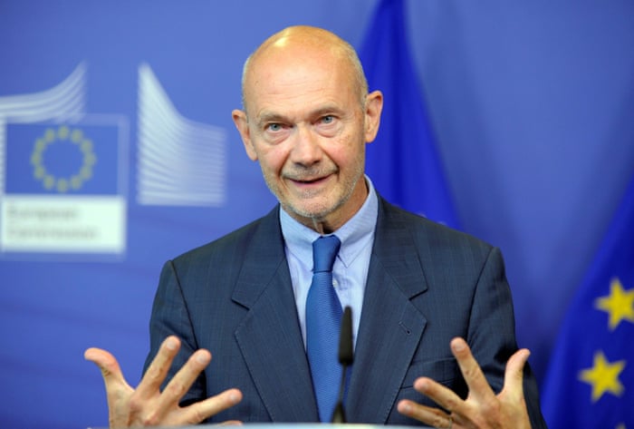Former World Trade Organization chief Pascal Lamy speaks during a news conference in Brussels.