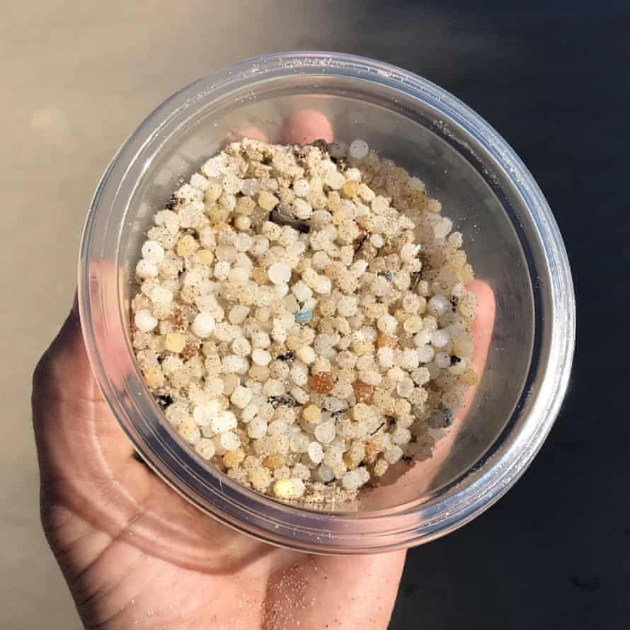 A bowl of nurdles collected on a beach