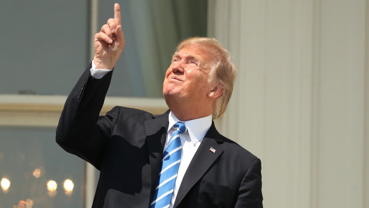 The Moment Donald Trump Is Warned Not To Look Directly At The Sun Video Us News The Guardian