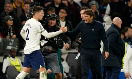 Matt Doherty shakes hands with his manager, Antonio Conte, after Tottenham’s victory against Everton on 15 October.