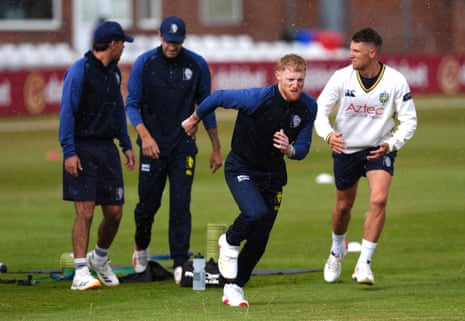 Ben Stokes dashs in from the rain.