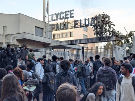 Students gather during a blockade at the Lycee Paul-Eluard high school in the northern Paris suburb of Saint-Denis