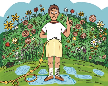 A man stands among puddles amid a lush flowery meadow, with a hosepipe down his shorts