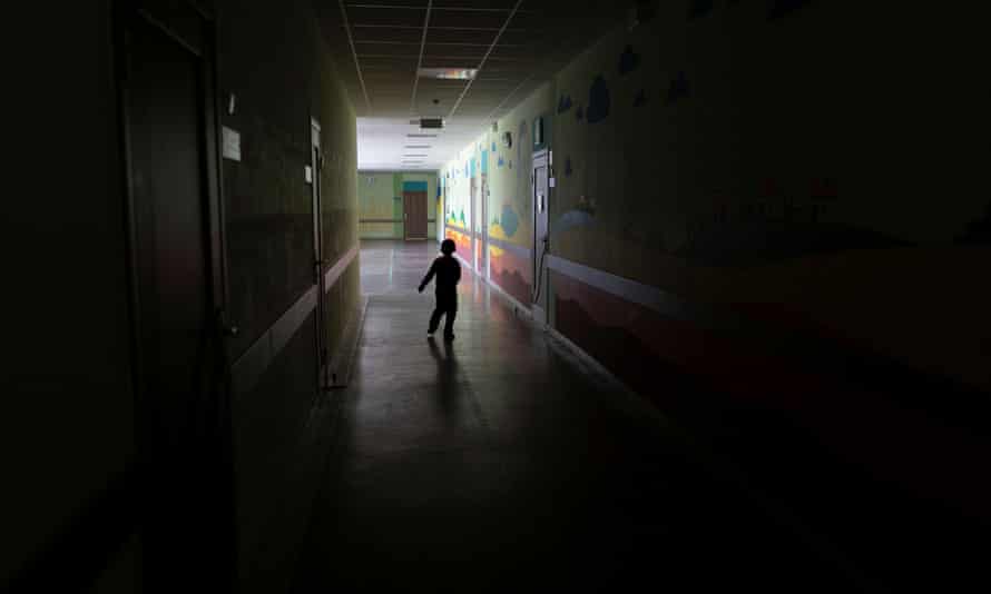 A child runs along a corridor of an empty school where he and his family take shelter at an underground bunker, amid Russia’s invasion of Ukraine, in Sloviansk, Donetsk region, Ukraine.