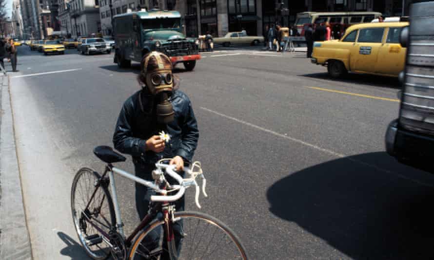 A cyclist marks Earth Day 1970 on 5th Avenue in New York.