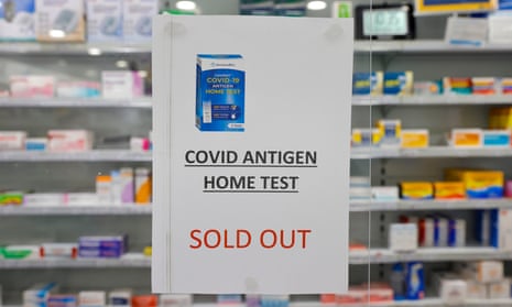 Sign at pharmacy saying rapid antigen tests sold out