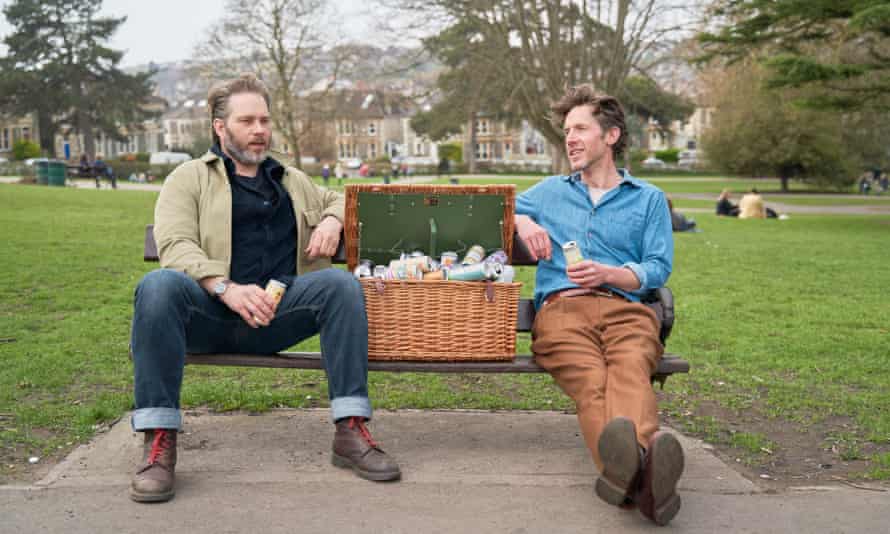 Richard Godwin, right, in Bristol with his friend Joe and a hamper full of canned drinks.