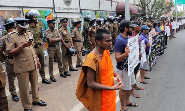 Sri Lankan protesters outside the Indian High Commission demand the immediate release of Indians who had staged protests to show solidarity with them.