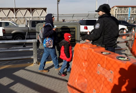 people cross a bridge