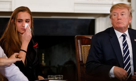 Julia Cordover, the student body president at Marjory Stoneman Douglas High School wipes away tears during a listening session hosted by Donald Trump at the White House
