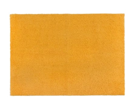 Dunelm Snuggle Washable Rug in yellow.