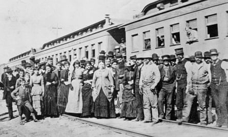 Large crowd with the first of the immigrant trains going to California, 1886.