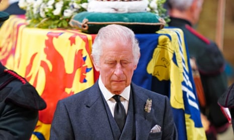 King Charles III stands at the head of his mother’s coffin in St Giles’ Cathedral, Edinburgh.