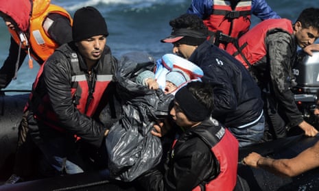 Migrants arrive by raft on the Greek island of Chios