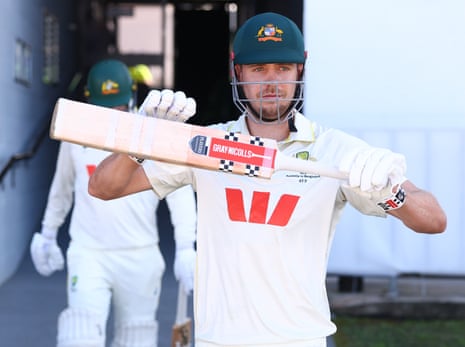Australia’s Cameron Green heads out to bat on day two