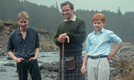 Rufus Kampa as Prince William, Dominic West as Prince Charles, and Fflyn Edwards as Prince Harry in season six of The Crown.