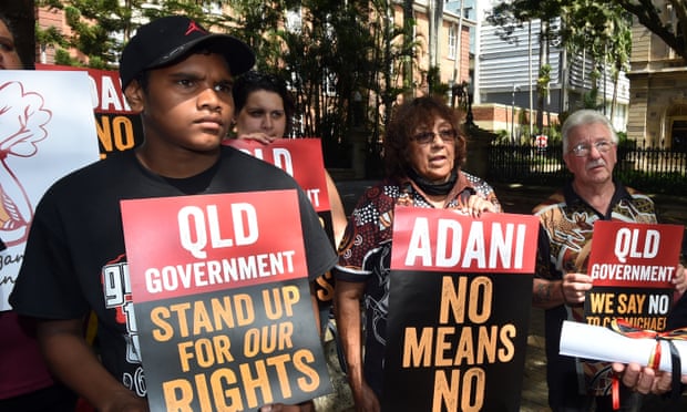 Wangan and Jagalingou people protest outside Queensland parliament in March 2015.