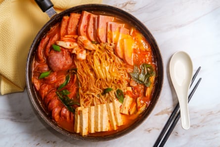 A bowl of Korean army-base stew, with tofu and slices of Spam