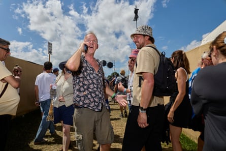 Norman Cook tries to find his daughter for Burning Spear at the Pyramid Stage.