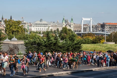 Several hundred refugees from Syria left Budapest, Hungary in September 2015 after deciding not to wait for trains to Germany and instead set out on foot for Austria.