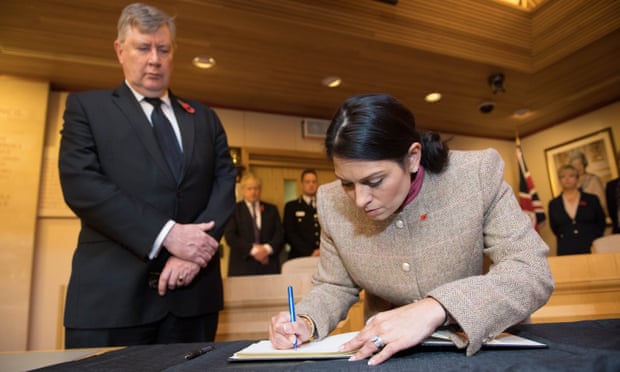 Home secretary Priti Patel signs a book of condolence for the 39 people who died in a lorry container in Essex.