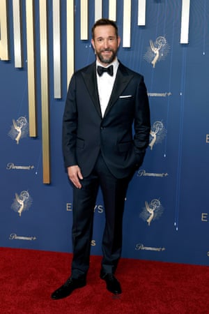 The Pit’s Noah Wyle, nominated for lead actor in a drama, traded blue scrubs for a navy suit