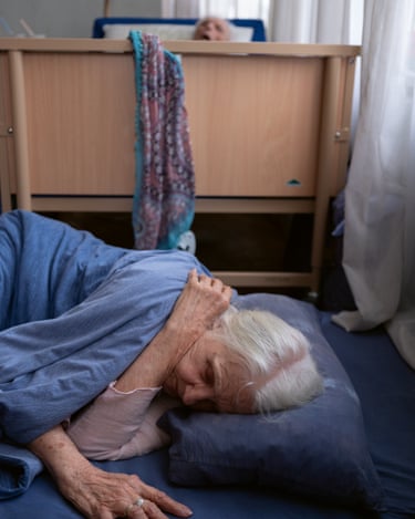 Every night, Christa sleeps on a folded-down mattress at her husband’s feet. She keeps emphasising how important it is for me to take these photos, insisting that the silence surrounding age and death needs to end. She longs for a society in whicha willingness to help and care for others is valued much more highly.