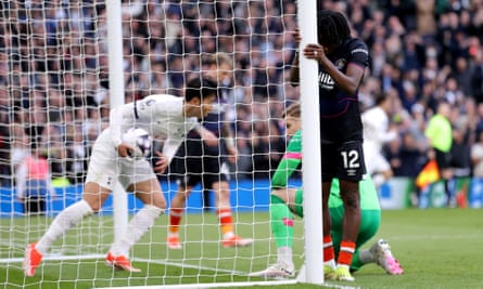 Issa Kaboré clutches the post after scoring an own goal