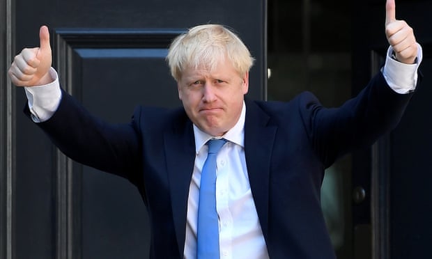 Boris Johnson celebrates victory in the Tory leadership election. — Photograph: Toby Melville/Reuters.