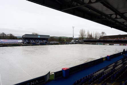 Protective covers at Moss Rose, Macclesfield's stadium.