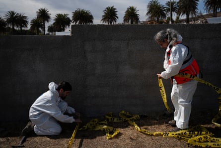 Members of the Legal Medical Service (SML) prepares the forensic excavations to find the remains of Woodward in Valparaiso, Chile.