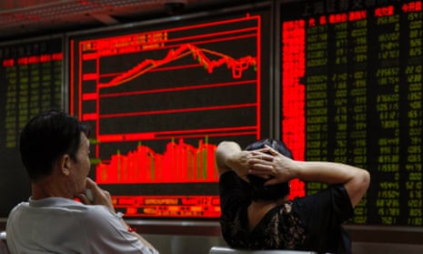 Chinese investors look at stock market board
