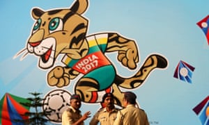 Indian police in front of the official mascot of the Fifa under-17 World Cup 2017, a clouded leopard called Kheleo, at the DY Patil stadium in Mumbai.