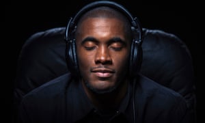 Man relaxing listening to music