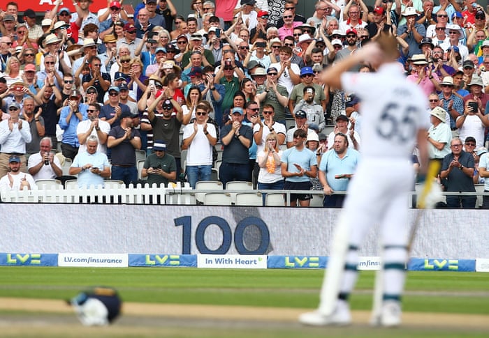 Fans applaud Ben Stokes of England after he hit 100 runs.