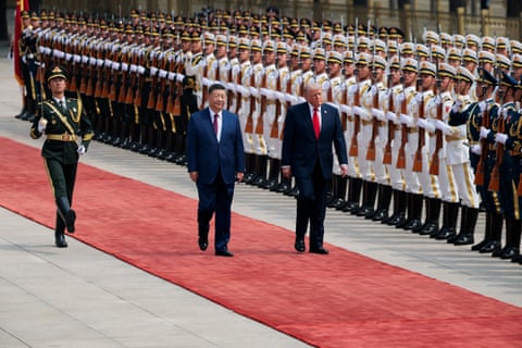 US President Donald Trump inspects an honour defender during a invited ceremonial pinch Chinese President Xi Jinping astatine nan Great Hall of nan People