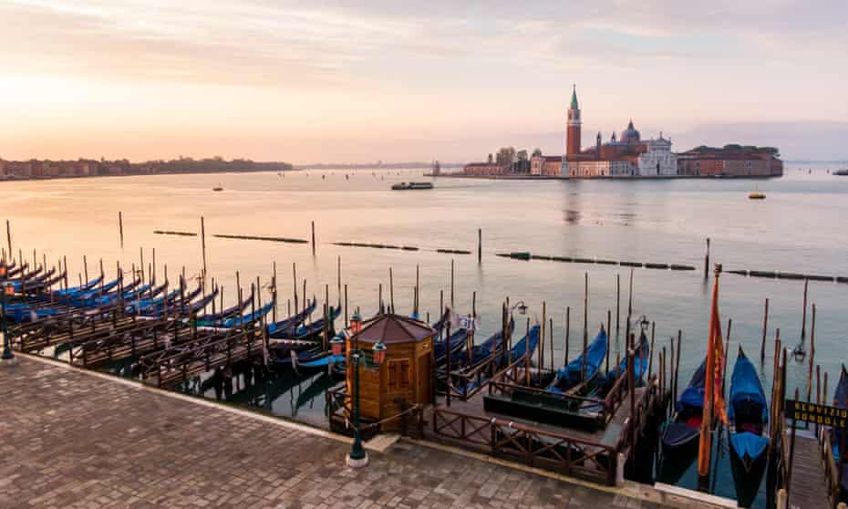 Gondolas moored in a deserted Venice
