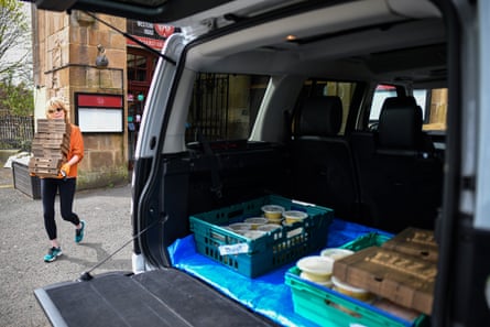 A volunteer collects food donations for NHS staff in Glasgow.
