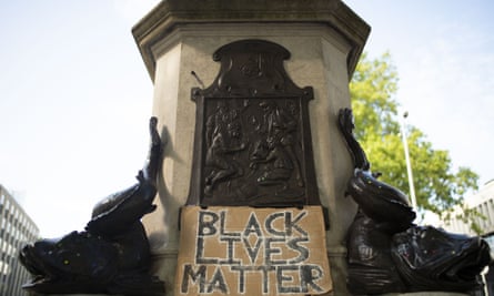 The Edward Colston statue plinth, with a Black Lives Matter sign, in Bristol, England.