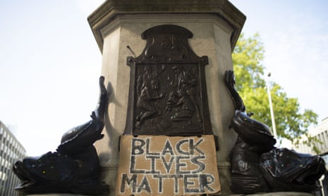 A plinth that held a statue of Edward Colston with a sign that reads ‘Black Lives Matter’ in Bristol, England