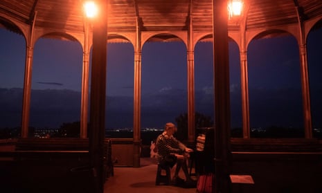 A man plays the piano in a park in downtown Kyiv on Saturday amid the ongoing Russian invasion.