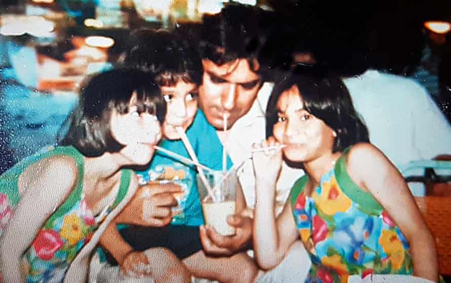 From left: Khola, Khizer and Javaria with their father, Raza Mir, in 1990.