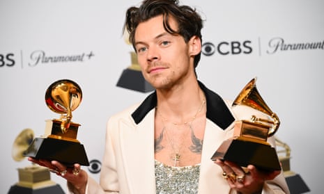 Harry Styles with his Grammy awards for best pop vocal album and album of the year 2023