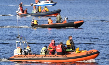 Boats are seen attempting to herd Northern Bottlenose whales from the Gare Loch through Rhu Narrows into the open sea ahead of a military exercise starting in the region on 1 October 2020 in Garelochhead, Argyll and Bute, Scotland.