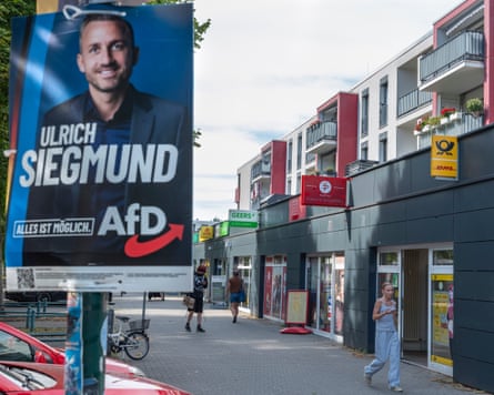 A billboard on a street showing the face of in AfD candidate Ulrich Siegmund