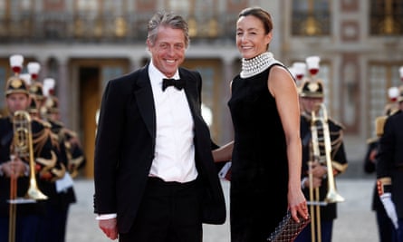 Hugh Grant and Anna Elisabet Eberstein arrive for the banquet.