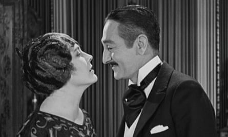 Edna Purviance and Adolphe Menjou in A Woman of Paris.