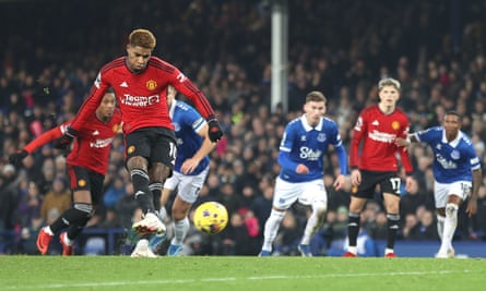 Marcus Rashford of Manchester United scores from a penalty