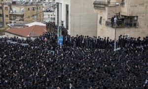 Thousands of ultra-Orthodox Jews participate in the funeral for prominent rabbi Meshulam Soloveitchik, in Jerusalem today.