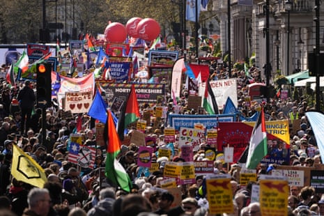People take part in a Together Alliance march